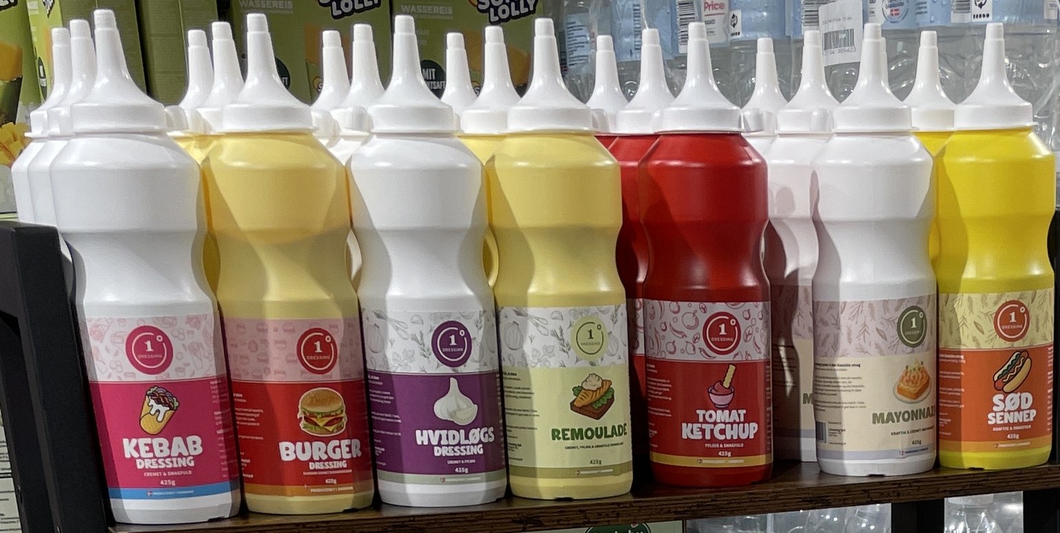 The 1 Dressing range: Kebab Dressing, Burger Dressing, Hvidløgs Dressing, Remoulade, Tomat Ketchup, Mayonnaise and Sød Sennep